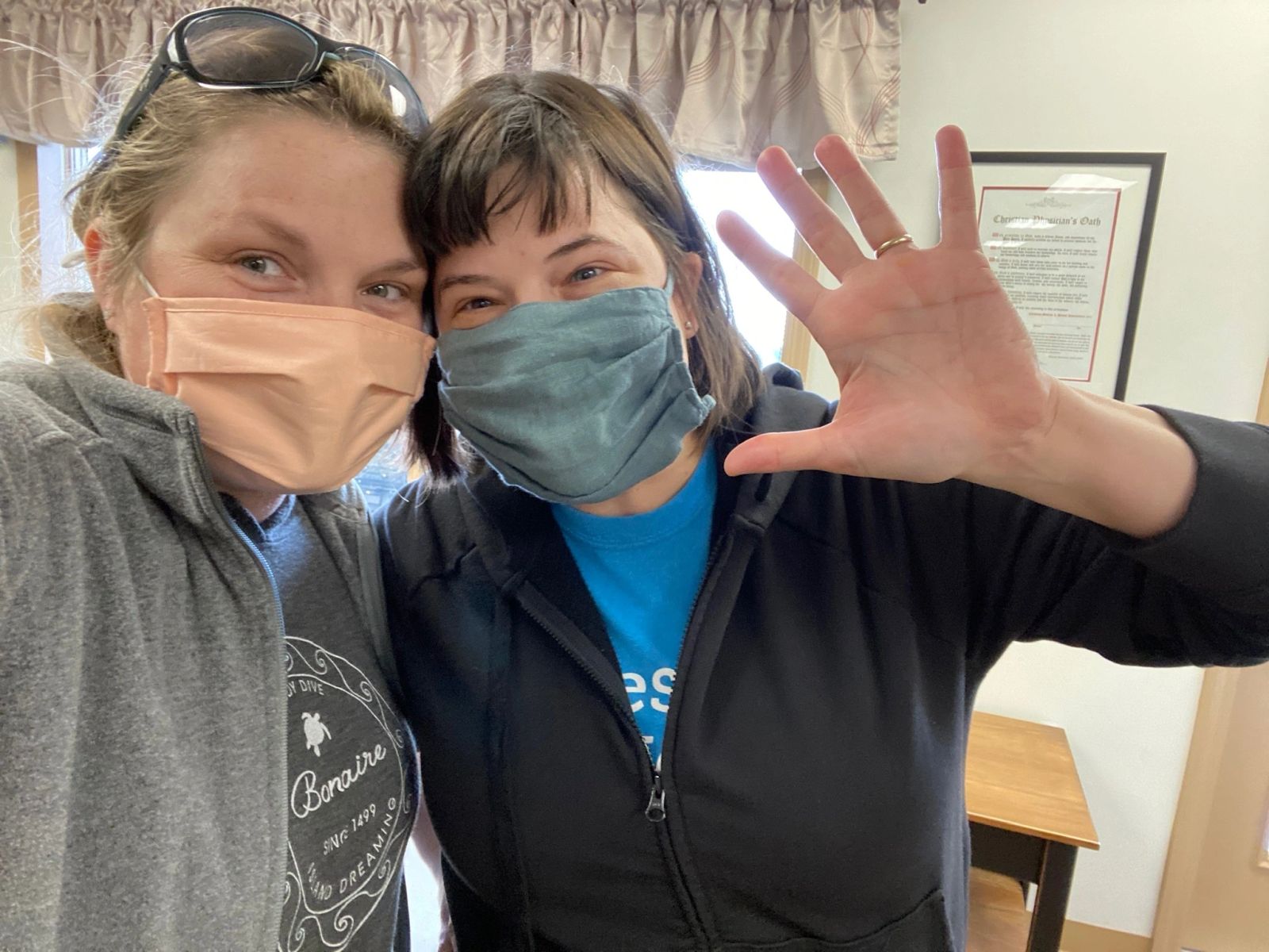 Rachael and Ellen waving hello at the office